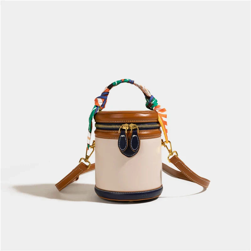 Dames bucket bag met sjaalhandvat en goudkleurige accenten