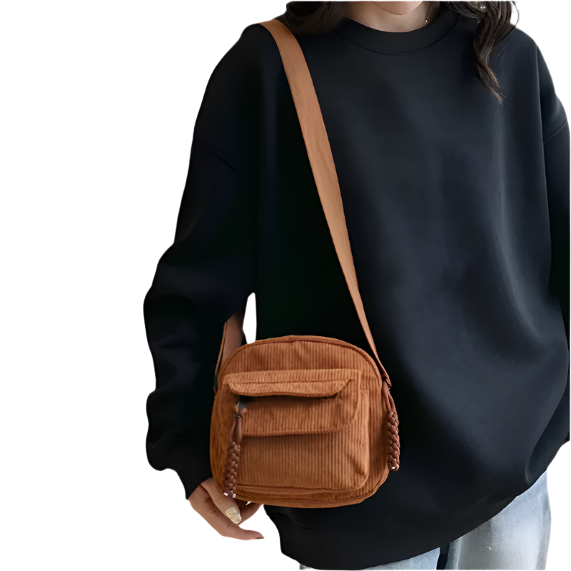 Dames crossbodytas met gebogen klep en ritsvak
