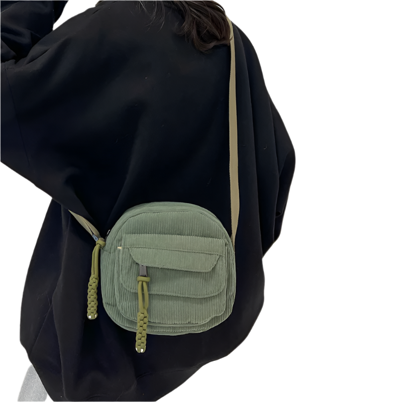 Dames crossbodytas met gebogen klep en ritsvak