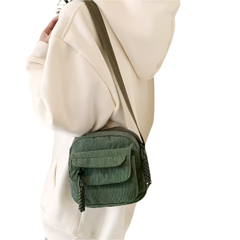 Dames crossbodytas met gebogen klep en ritsvak