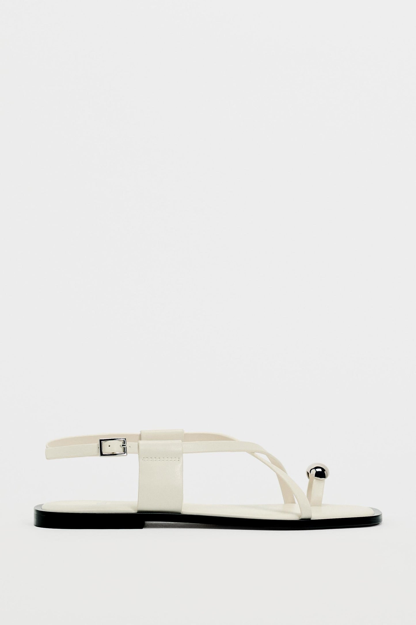 Dames platte sandalen met teenring en metallic detail