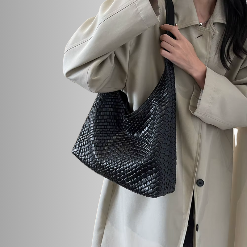 Dames schoudertas met gevlochten structuur en ronde pouch