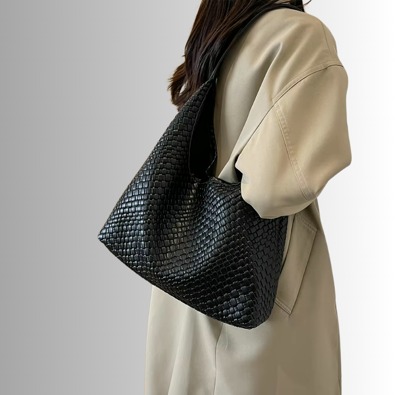 Dames schoudertas met gevlochten structuur en ronde pouch