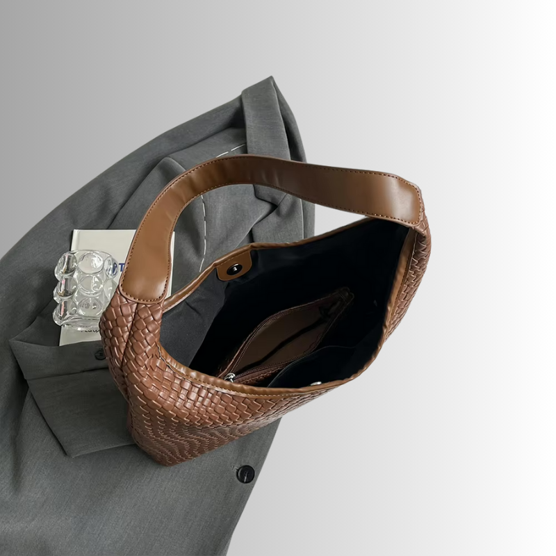 Dames schoudertas met gevlochten structuur en ronde pouch