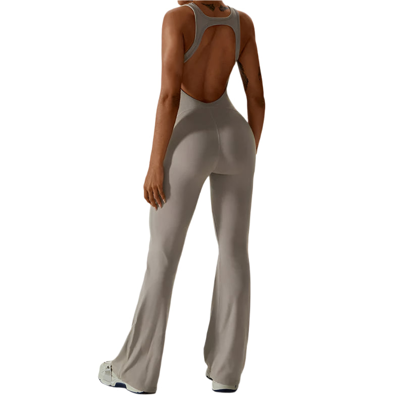 Dames sportjumpsuit met open rug en liftend silhouet