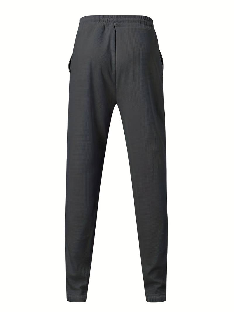 Heren trainingspak met halve rits en rechte broek