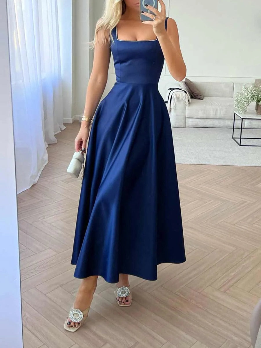 Dames cocktailjurk met versierd lijfje en midilengte