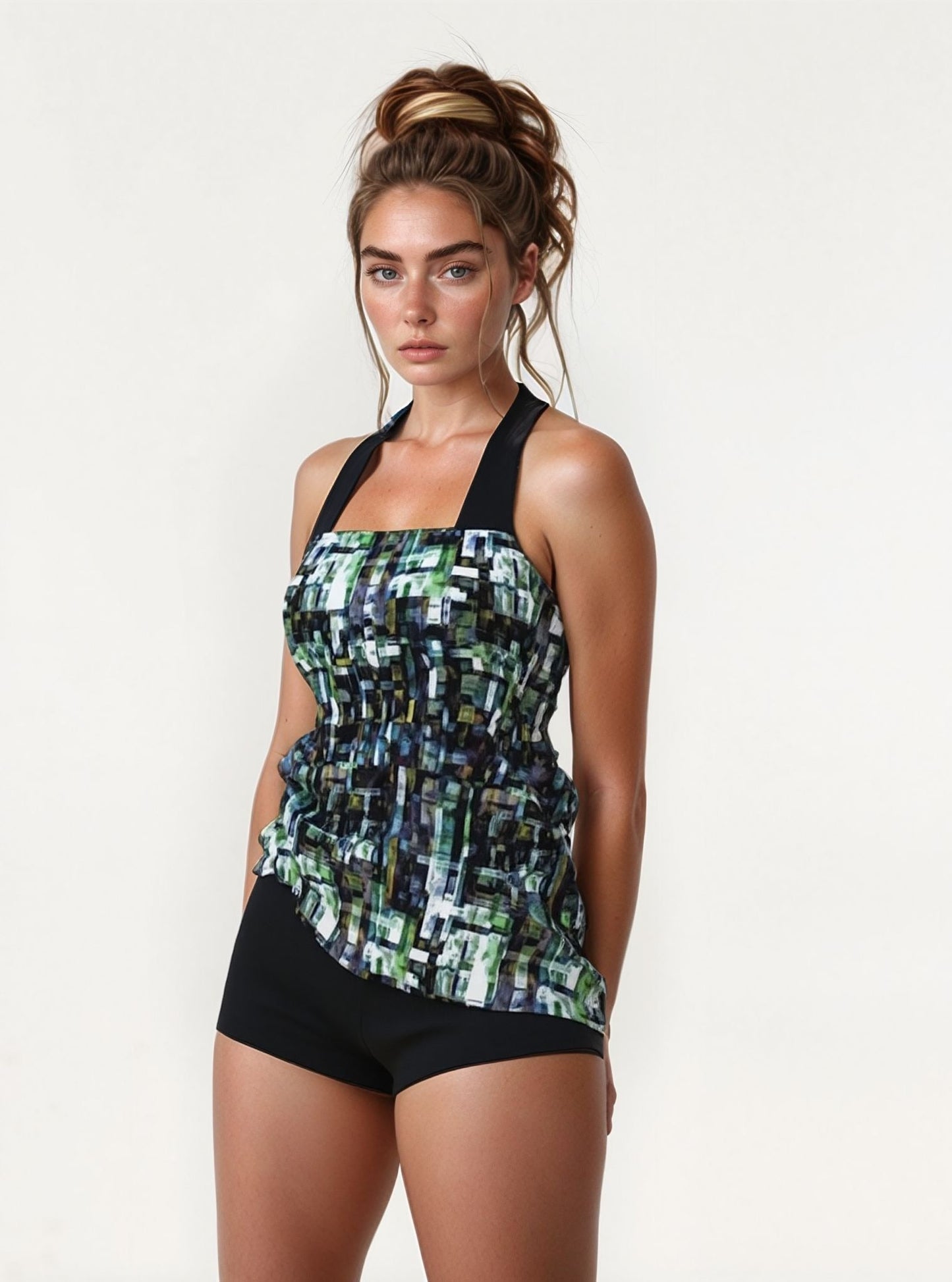 Tweedelig tankini badpak – haltertop met bloemenprint en bijpassende zwembroek Modehuis-Nederland