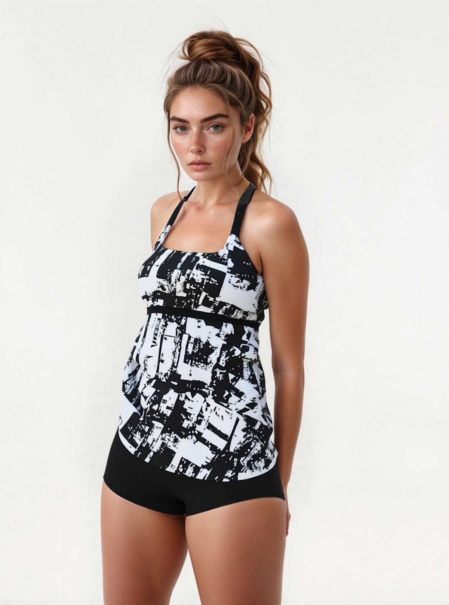 Tweedelig tankini badpak – haltertop met bloemenprint en bijpassende zwembroek Modehuis-Nederland