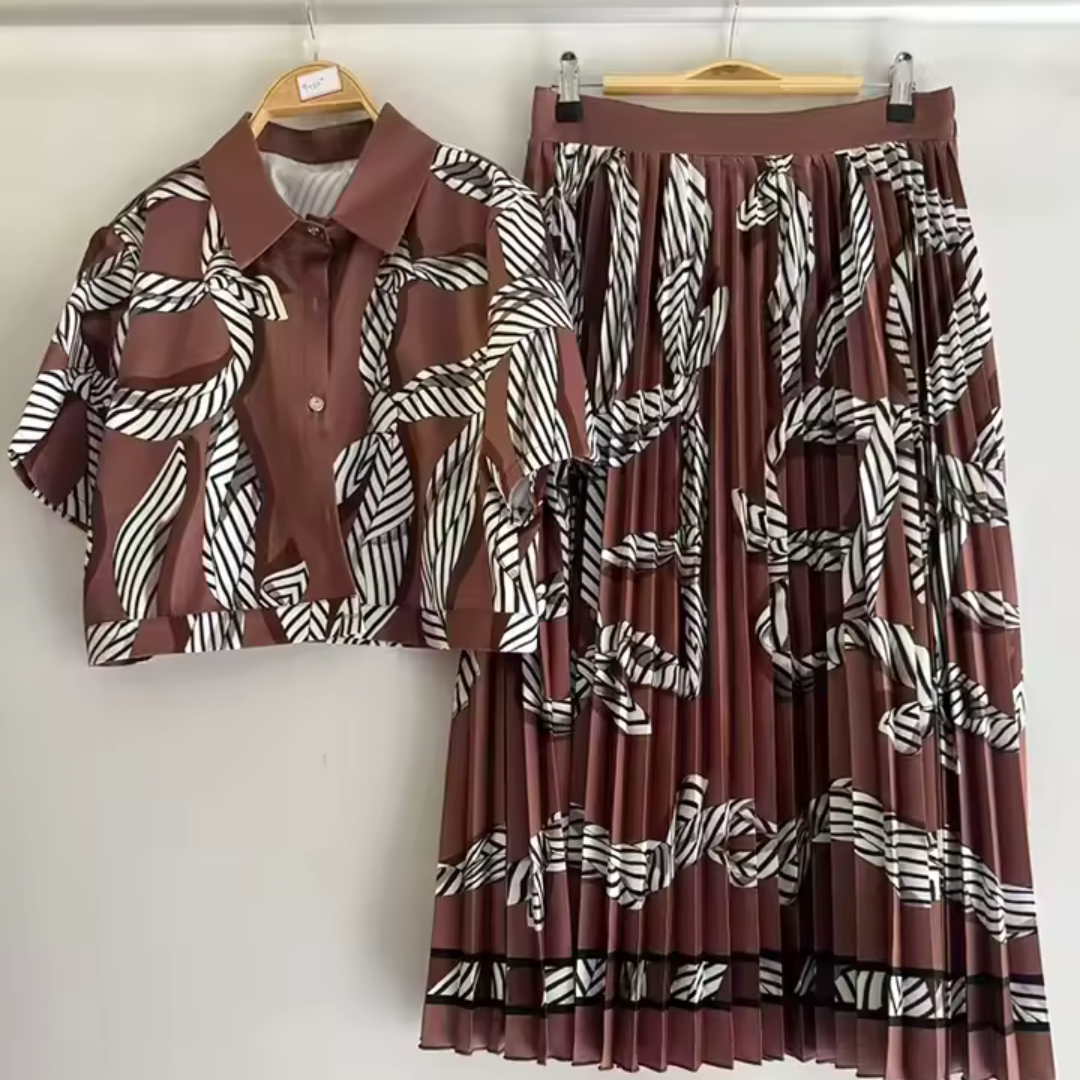 Rafaela | Tweedelige dames set met blouse en geplisseerde midi-rok voor dames Modehuis-Nederland