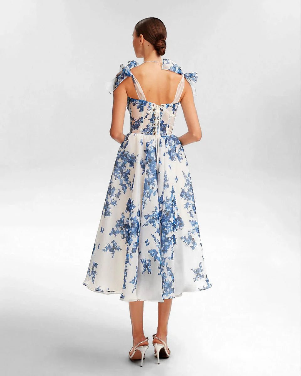 Elara – Romantisches Midi-Kleid mit floraler Stickerei und Schleifendetails Modehuis-Nederland