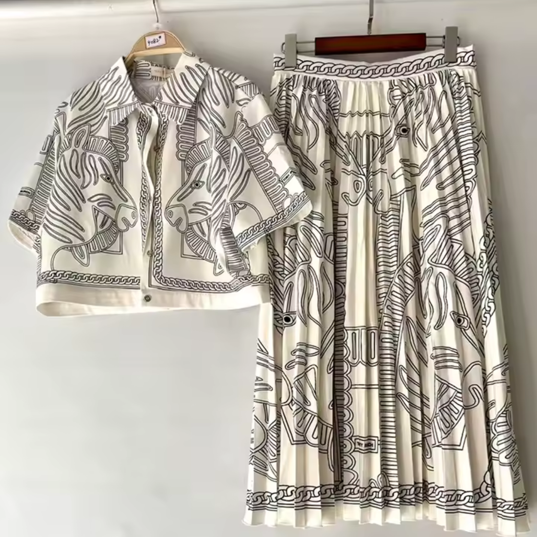 Rafaela | Tweedelige dames set met blouse en geplisseerde midi-rok voor dames Modehuis-Nederland