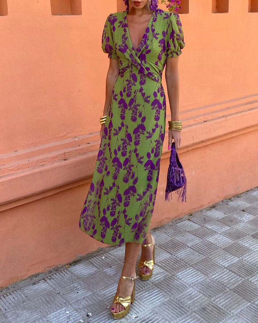 Dames wikkeljurk met bloemenprint en pofmouwen