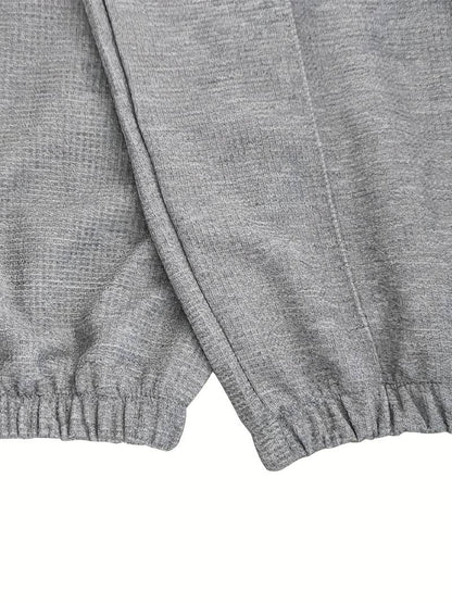 Heren trainingspak met halve rits en rechte broek