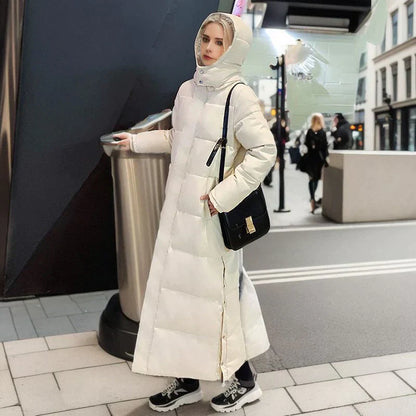 Dames lange winterjas met strakke belijning en hoge kraag