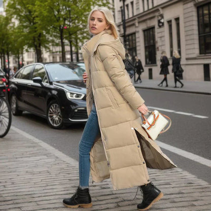 Dames lange winterjas met strakke belijning en hoge kraag