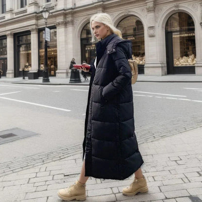 Dames lange winterjas met strakke belijning en hoge kraag