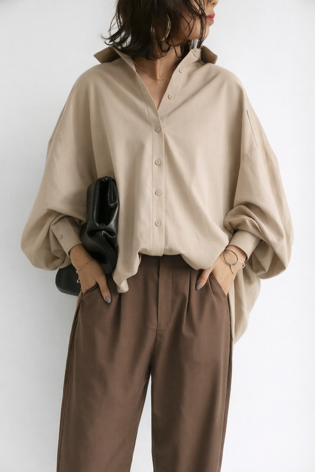 Oversized damesblouse met knoopsluiting en lange mouwen