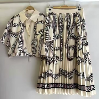 Rafaela | Tweedelige dames set met blouse en geplisseerde midi-rok voor dames Modehuis-Nederland