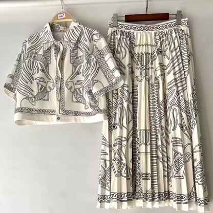 Rafaela | Tweedelige dames set met blouse en geplisseerde midi-rok voor dames Modehuis-Nederland