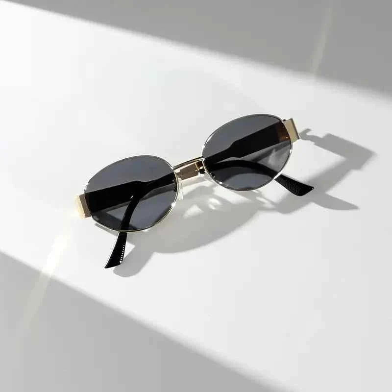 Elina – Ovale Damen-Sonnenbrille mit Metallrahmen und dunklen Gläsern Modehuis-Nederland