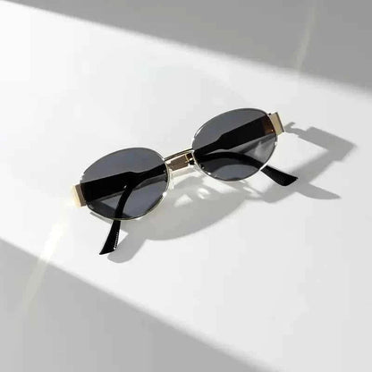 Elina – Ovale Damen-Sonnenbrille mit Metallrahmen und dunklen Gläsern Modehuis-Nederland