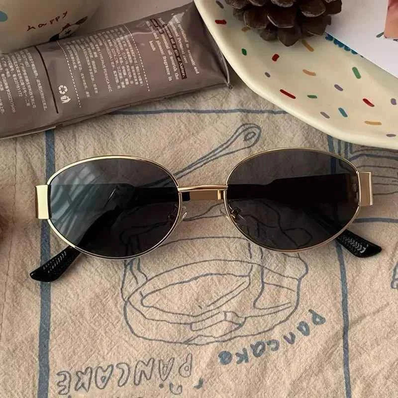 Elina – Ovale Damen-Sonnenbrille mit Metallrahmen und dunklen Gläsern Modehuis-Nederland
