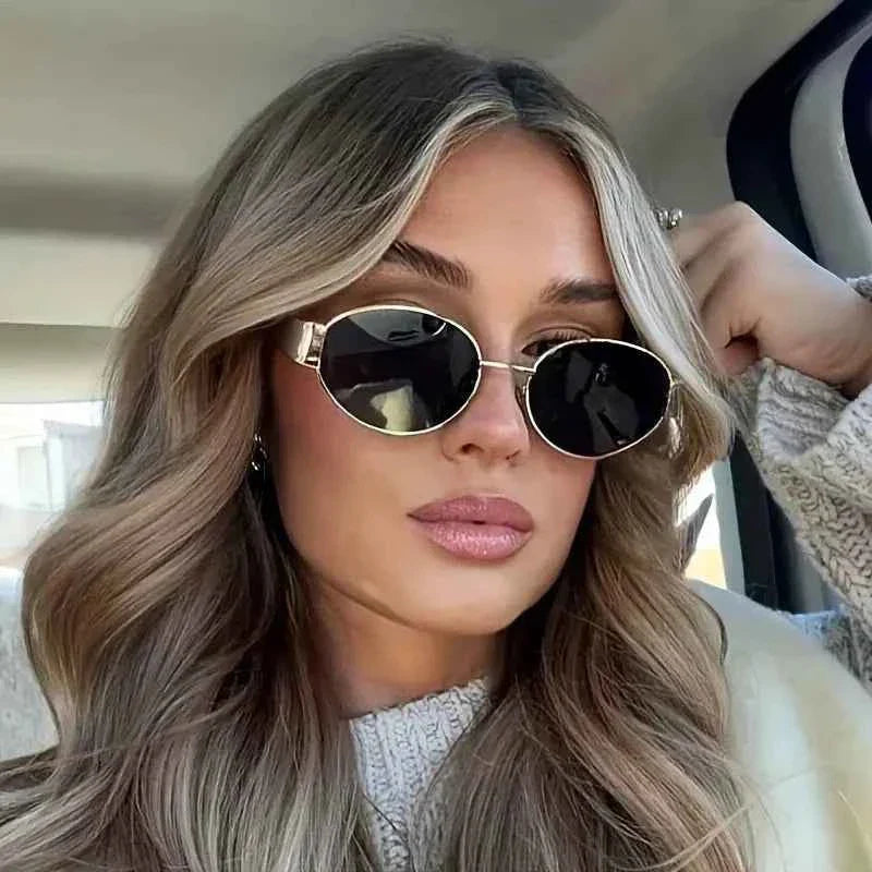 Elina – Ovale Damen-Sonnenbrille mit Metallrahmen und dunklen Gläsern Modehuis-Nederland