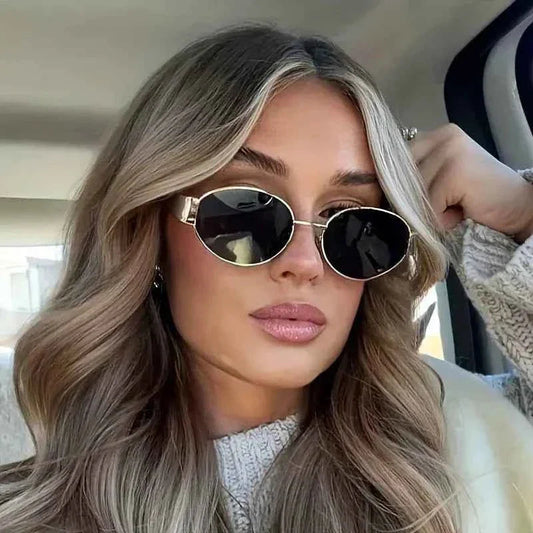 Elina – Ovale Damen-Sonnenbrille mit Metallrahmen und dunklen Gläsern Modehuis-Nederland